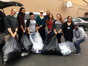 AUHS delivers over 2,000 pairs of socks to the MHA Village to give to the homeless this winter.